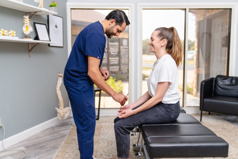 Chiropractor providing gentle care during a wellness-focused session to promote relaxation